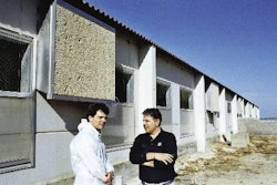 Dr Lorenzo Merino (at right), with Agric-Bemvig sales manager Ferran Meinhardt, started his herd in 2004 to produce piglets on contract inside cooled-air houses.