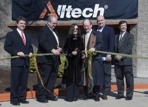 President of Alltech, Dr. Pearse Lyons cuts the ribbon at Alltech Algae in Winchester alongside his wife Deirdre (center), (from left) Judge Executive Branham, Mayor Burtner, Secretary Hayes, and Alltech’s CFO Nathan Hohman.
