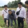 USSEC Soybean Meal Japan Swine Training course participants inspect the field at Bob Haselwood’s soybean farm near Berryton, Kansas.