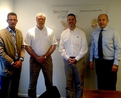 André van Rij, Petersime area sales manager; Dave Juenger, Cobb director of global support services; Ben Green, Cobb director of hatcheries; and Michel De Clercq, Petersime managing director, commemorate a new partnership between Cobb and Hubei Tong Xing Agriculture Co., using Petersime's services.