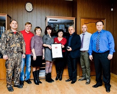 Agromerkur staff members celebrate their membership into the Ross 400 Club.