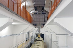 Van Aarsen’s robot collects feed from the bins and travels back to the load-out area where it uses laser positioning to find the hatch on the truck and fill it with the correct amount of product. | Van Aarsen