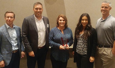 From left, Wayne Farms’ Aaron Leach and Craig Watkins recognize award recipients Christie Albritton and Lindsey Albritton of Albritton Farms and subsidiary RWH Refrigerated Solutions. They are flanked by Jason Wallis, Wayne Farms. | Photo courtesy of Wayne Farms