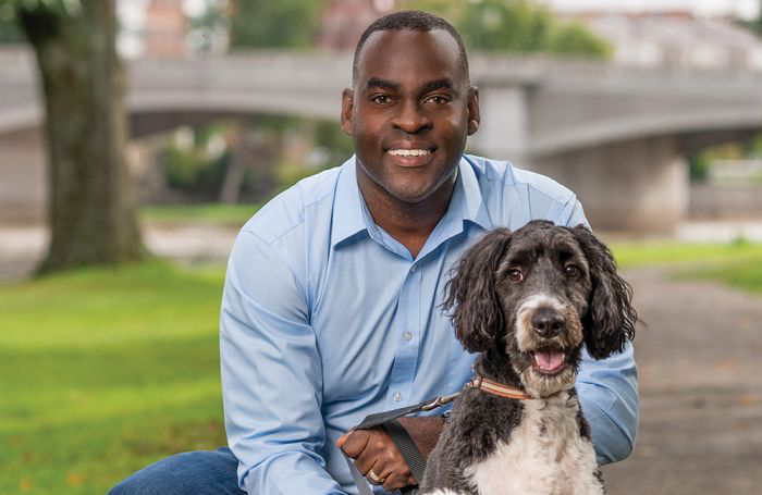 Targeted Pet Treats President Gregory Austin, here with white Maltese Poodle mix (Maltipoo) Jeffrey and Australian Shepard Poodle mix (Aussie Doodle) Jackson, credits his team and his company&rsquo;s ability to stay on top of trends with TPT&rsquo;s triple-digit sales growth and overall success. | Photo courtesy Targeted Pet Treats