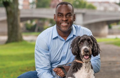 Targeted Pet Treats President Gregory Austin, here with white Maltese Poodle mix (Maltipoo) Jeffrey and Australian Shepard Poodle mix (Aussie Doodle) Jackson, credits his team and his company’s ability to stay on top of trends with TPT’s triple-digit sales growth and overall success. | Photo courtesy Targeted Pet Treats
