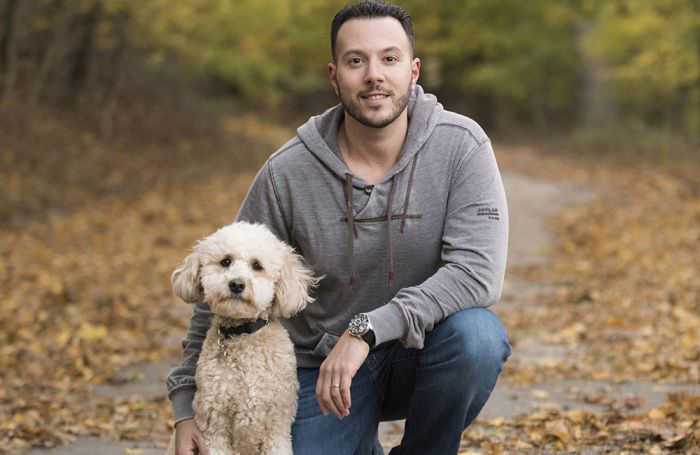 Brad Gruber, president and COO of Health Extension Pet Care, here with his Mini Goldendoodle Blaze, says that partnerships with their retailers and constant improvement have been vital to Health Extension&rsquo;s success. | Photo courtesy Health Extension Pet Care
