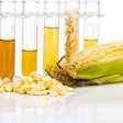 Corn Generated Ethanol Biofuel With Test Tubes On White Backgrou