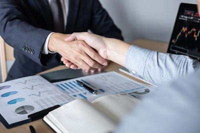 Finishing Up A Meeting, Handshake Of Two Executive Business Peop