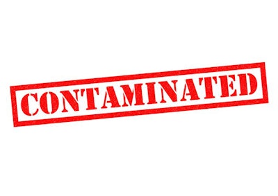 CONTAMINATED red Rubber Stamp over a white background.