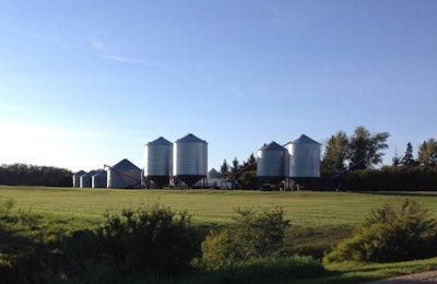 grain-bins-in-field