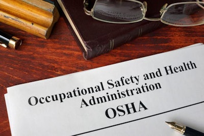 Occupational Safety and Health Administration OSHA and a book.