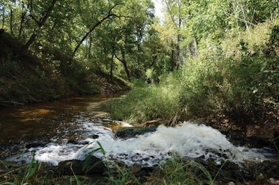 The facility recently installed a privacy fence around its wastewater treatment complex to improve the view of residential neighbors and those using an adjacent trail. (Photo by Austin Alonzo)