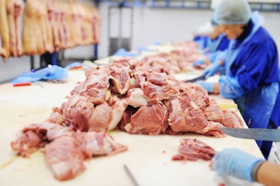 Processing Of Meat At A Meat-packing Plant. Food Industry