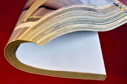 The Magazine Is A Paper Printed Periodical, On A Red Creative Ba