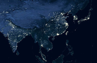 Earth At Night, View Of City Lights Showing Human Activity In In