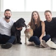 Open Farm co-founders Derek Beigleman, Jacqueline Prehogan and Isaac Langleben, here with Golden Retriever mix Molly and Puggle Bella, wants to lead the pet food industry towards sustainability by changing the way pet food is sourced and produced. | (Courtesy Open Farm)