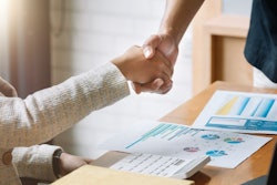 Business People Handshake For Teamwork Of Business Merger And Ac