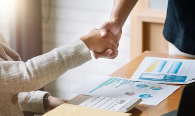 Business People Handshake For Teamwork Of Business Merger And Ac