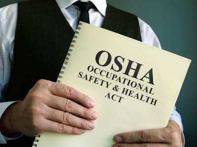 Osha Occupational Safety & Health Act In The Hands.