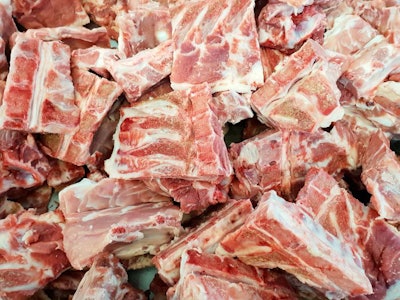 Top View Of Pork Bones As A Background In The Market For Sale At