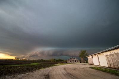 A Shelf Cloud And Storm Approach Old Farm Buildings In The Midwe