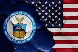 Flags Of Department Of Commerce And Usa Painted On Cracked Wall