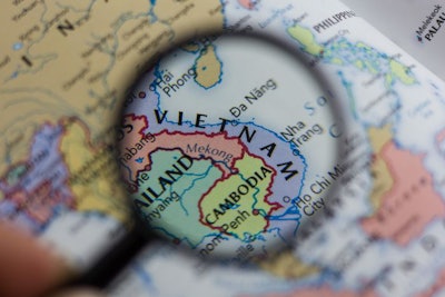 Vietnam On The Map Of The World Or Atlas.