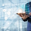 Businessman using tablet analyzing sales data and economic growth graph chart. Business strategy. Abstract icon. Digital marketing.