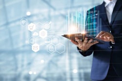 Businessman using tablet analyzing sales data and economic growth graph chart. Business strategy. Abstract icon. Digital marketing.