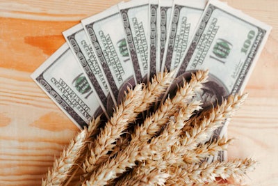 Wheat Ears And Dollars On Wooden Background. Economy Crisis Conc