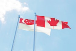 Singapore and Canada, two flags waving against blue sky. 3d image