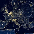 Earth At Night, View Of City Lights Showing Human Activity In Eu