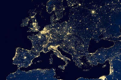Earth At Night, View Of City Lights Showing Human Activity In Eu
