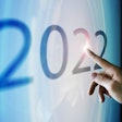 Businessman touching the screen about 2022