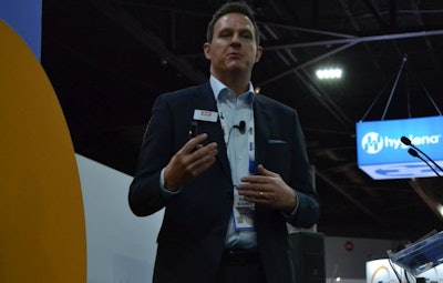Rob Steiner, Ziggity Systems account manager, explains the benefits of having gender-specific drinkers and drinker lines in broiler breeder operations. (Roy Graber)