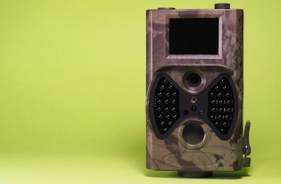 Waterproof wildlife trail camera. Battery powered outdoor photo and video camera