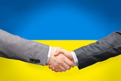political, business and national concept – close up of handshake
