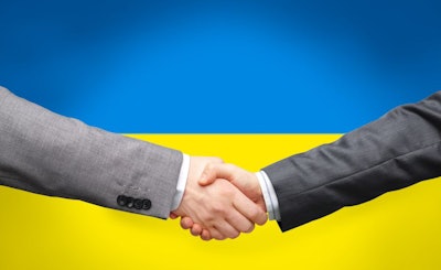 political, business and national concept – close up of handshake