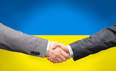 political, business and national concept – close up of handshake
