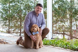Compana Pet Brands CEO John Howe, seen here with Goldendoodle Bear, has been with the company for 22 years and in that time has seen the company grow significantly. | Courtesy Compana Pet Brands