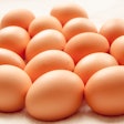 A group of Brown hens eggs on a white background