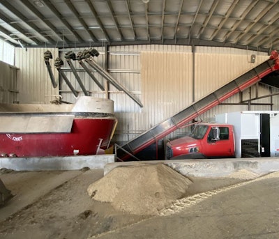 Automation of augers, as pictured above, provides a higher level of accuracy for high-cost and low-inclusion ingredients for rations. This type of system can be used in conjunction with a payloader in the same mixer. (Courtesy Easy Automation)
