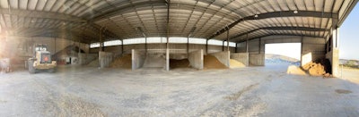 Panoramic view of the combination feed center to include payloader ingredients and auger-measured ingredients to mix the rations. (Courtesy Easy Automation)