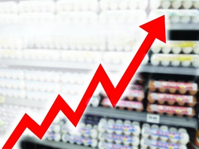 Abstract blurred image of big red arrow growing on egg background. Bar charts and charts. Food prices rose. Inflation concept. retail. Finance. stock market. shop.