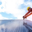 Solar Panel Technician With Drill Installing And Maintenance Sol