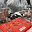 During the Petsure Imaginarium seminar at Auburn University, participants made pet treats with meat co-products, guided by students researching the concept.