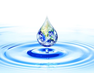 World day for water. Earth drop on ripple surface of water. Elements of this image furnished by NASA.