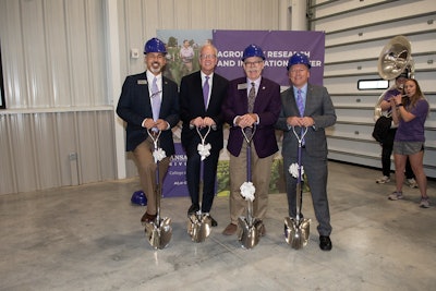 Raj Khosla, head, K-State Department of Agronomy; U.S. Sen. Jerry Moran; Ernie Minton, dean, K-State College of Agriculture; Richard Linton, K-State president.