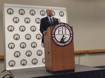 gerald-lessard-at-podium