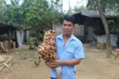 Lap And His Son One Of Beneficiay In Quyet Thang Commune